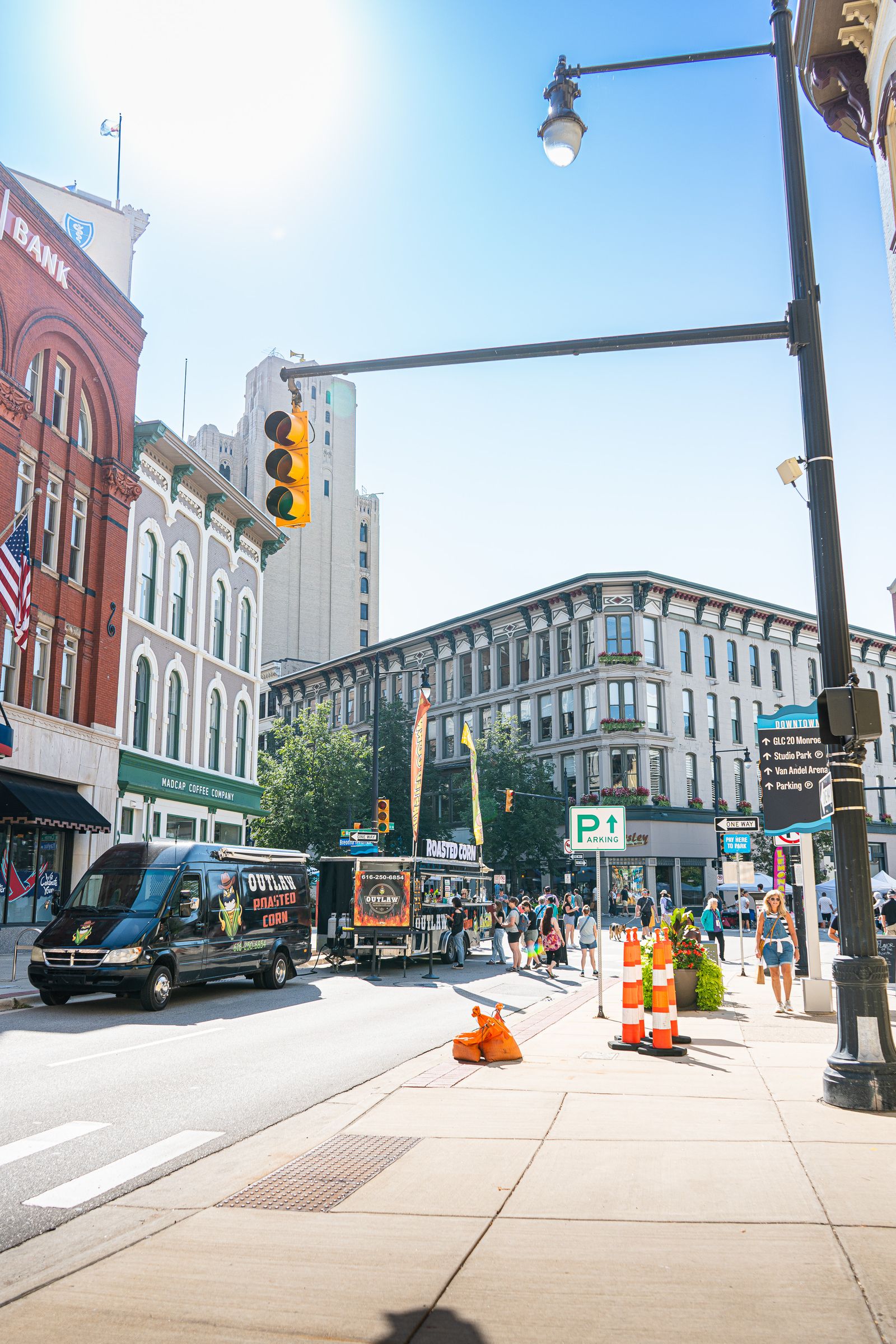 Sunny downtown street lined with local shops and storefronts, the kind of small-town main street local SEO Ontario businesses in Chatham-Kent rely on for foot traffic